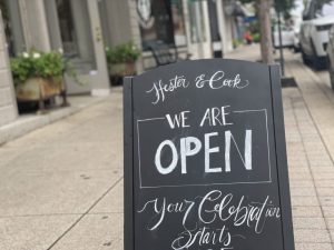 "We Are Open" sign at a boutique in Downtown Franklin, TN