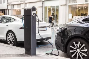 Electric car are being charged by charging stations in local TN